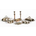 A large collection of Sheffield plated candlesticks, silver plated entree dishes etc.