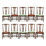 A set of ten mahogany Hepplewhite style dining chairs, with pierced splat backs, drop in seats,