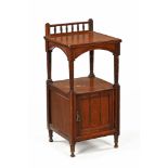 A late Victorian walnut bedside cabinet with galleried upstand,