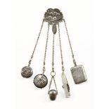 A chatelaine with silver Vesta case, silver mounted pin cushion,