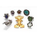 An antique collection of Tibetan silver coloured metal and other rings and jewellery.