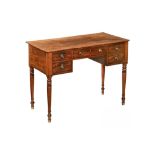 An early 19th century mahogany dressing table,