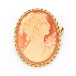 A 9 ct gold mounted cameo brooch, with receipt.