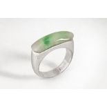 An 18 ct white gold and jade ring, Size N, 4.6 grams gross.