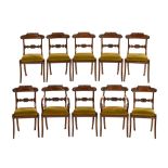 A set of ten Regency mahogany brass strung dining chairs, each with bowed top rail,