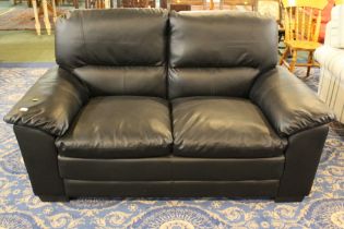 Black leatherette two seater settee, height 80 cm, width 160 cm,
