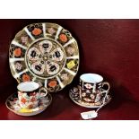 Royal Crown Derby Imari bowl and two coffee cans and saucers