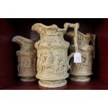 Three stoneware jugs with Grecian relief decoration