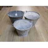 Three galvanized pails,