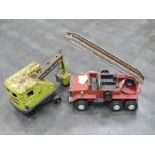 Vintage tin plate crane and fire engine