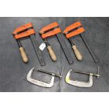 Three orange clamps and pair of Record Junior 4 clamps