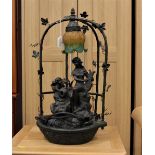 Metal lamp water fountain, cherub and fairy,