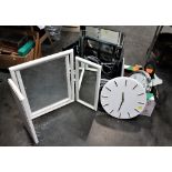 Two dressing table mirrors and three modern wall clocks