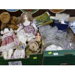 Two boxes of glassware, collectors' dolls, doilies, fabric,