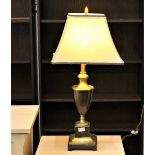 Metal column form lamp base with shade