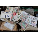 Two boxes of loose stamps