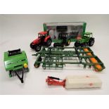 Collection of Siku 1-32 scale farming equipment, three tractors, box front loader set, baler,
