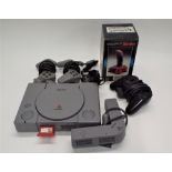 Sony Playstation and selection of controllers and joystick