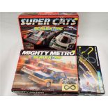 Scalextric Mighty Metro set and Super Cats set and track extension pack