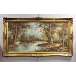 Oil painting of wooded scene in gilt coloured frame,