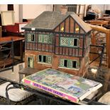 Vintage dolls house and flat packed kids dream house