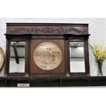 Carved oak mantel mirror with centre picture of lady feeding seagulls,