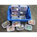 Plastic boxes containing beaded necklaces, beads,