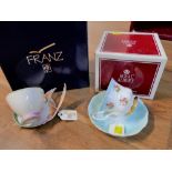 Boxed Franz Butterfly cup and saucer and Royal Albert Forget Me Not Rose cup and saucer