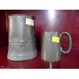 Pewter quart mug dated 1881 and smaller glass bottomed mug