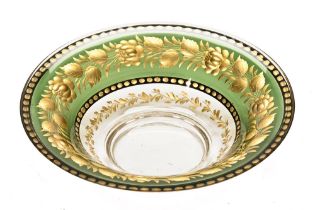 A late 19th/early 20th century Bohemian green and clear glass bowl,