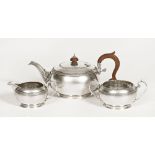 A George V silver three piece tea service, Birmingham 1929, maker Docker & Burn Limited.