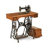 A late 19th century sewing machine, manufactured by PFAFF with oak,