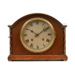 An early 20th century mahogany mantel clock,