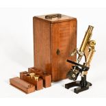 An early 20th century brass and black enamelled monocular microscope, by Leitz, Wetzlar No 89780,