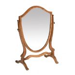 An Edwardian shield shaped dressing table mirror. Height 57 cm, width 40 cm, depth 23.5 cm.