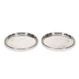 A pair of circular silver shallow trays, with beaded rims Birmingham 1974,