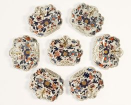 A collection of seven Masons Ironstone dishes. Each 21 x 24.5 cm. (see illustration).