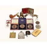 A collection of miscellaneous medals, pincushion, small icons, thimbles etc.