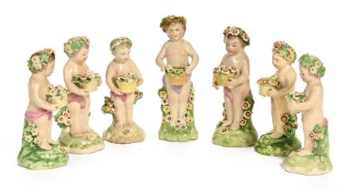 Seven pottery figurines. Tallest 13 cm.