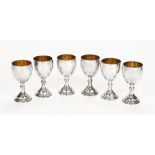 A set of six hallmarked silver goblets, London 1975, maker Henwood Decorative Metal Studios.