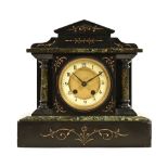A Victorian black and vein marbled mantel clock,