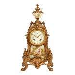 Medaille D'Argent of France, a gilt metal and porcelain mantel clock,