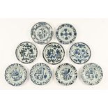 A set of nine 18th century Chinese export, blue and white plates. Each 23 cm diameter.