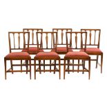 A set of six late Georgian country mahogany dining chairs,