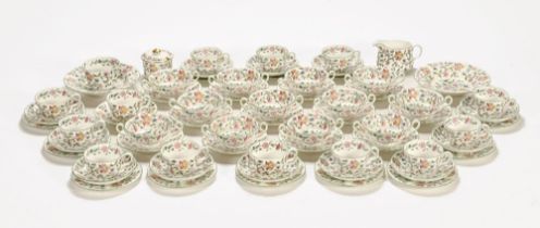 A Minton Haddon Hall part tea set, comprising teacups, saucers, milk,