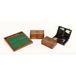 A Victorian walnut writing slope, another in rosewood, a mahjong box and a leather document box.