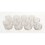 A set of sixteen etched glass dessert bowls.