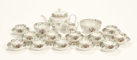 A collection of 19th century New Hall tea bowls, saucers, cream jug, teapot etc.