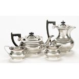 A four piece silver tea service, comprising teapot, hot water jug, sugar basin and cream jug,