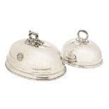 Two 19th century silver plated meat dish covers. Largest length 38 cm.